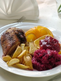 Traditional style roast duck with apples